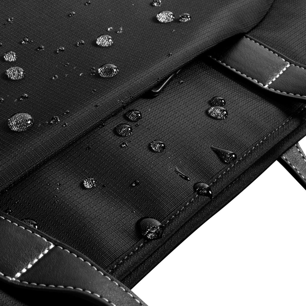 Versatile-T23 Laptop Tote Bag features durable YKK zippers that are waterproof and splash-resistant, ensuring your belongings stay dry in all conditions.
